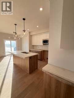 516 Heritage Boulevard, Cochrane, Alberta  T4C 2J8 - Photo 7 - A2277144