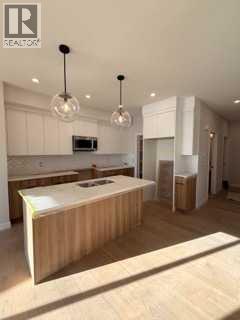 516 Heritage Boulevard, Cochrane, Alberta  T4C 2J8 - Photo 8 - A2277144