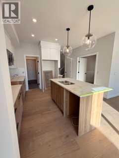 516 Heritage Boulevard, Cochrane, Alberta  T4C 2J8 - Photo 9 - A2277144