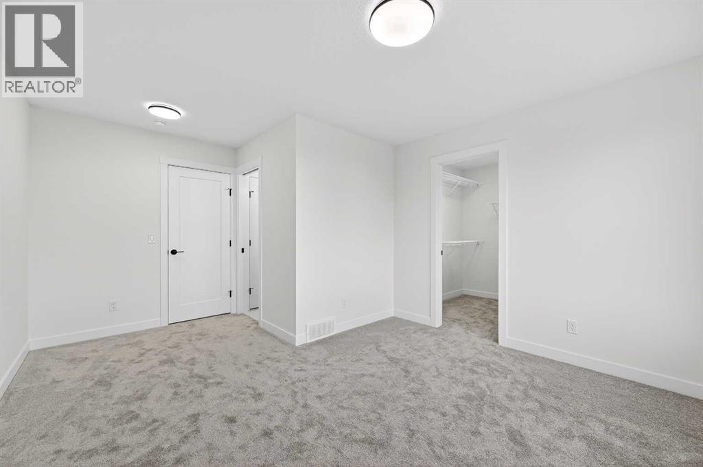 29 Rowmont Common Nw, Calgary, Alberta  T3L 0L4 - Photo 26 - A2277545