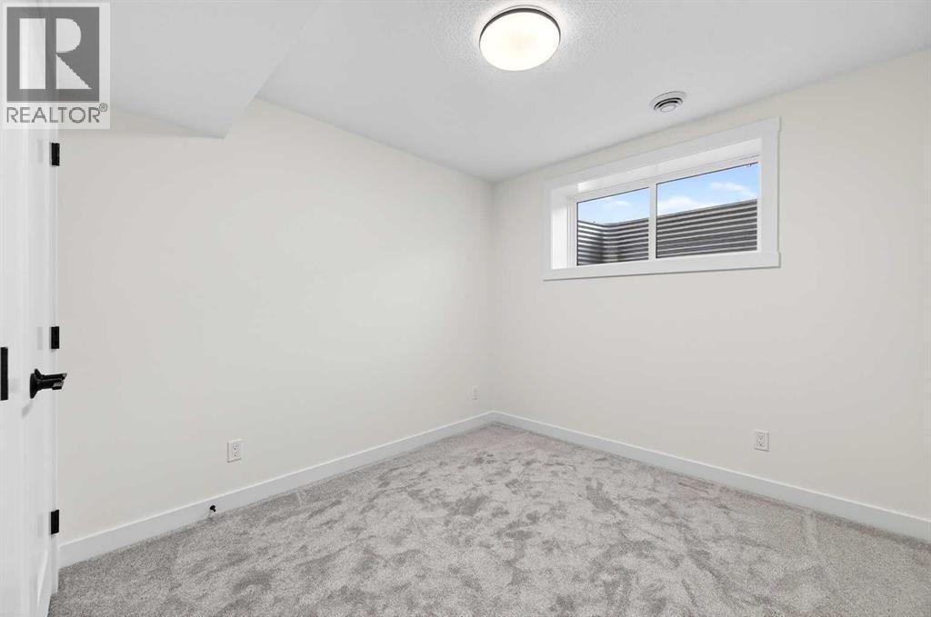 29 Rowmont Common Nw, Calgary, Alberta  T3L 0L4 - Photo 35 - A2277545