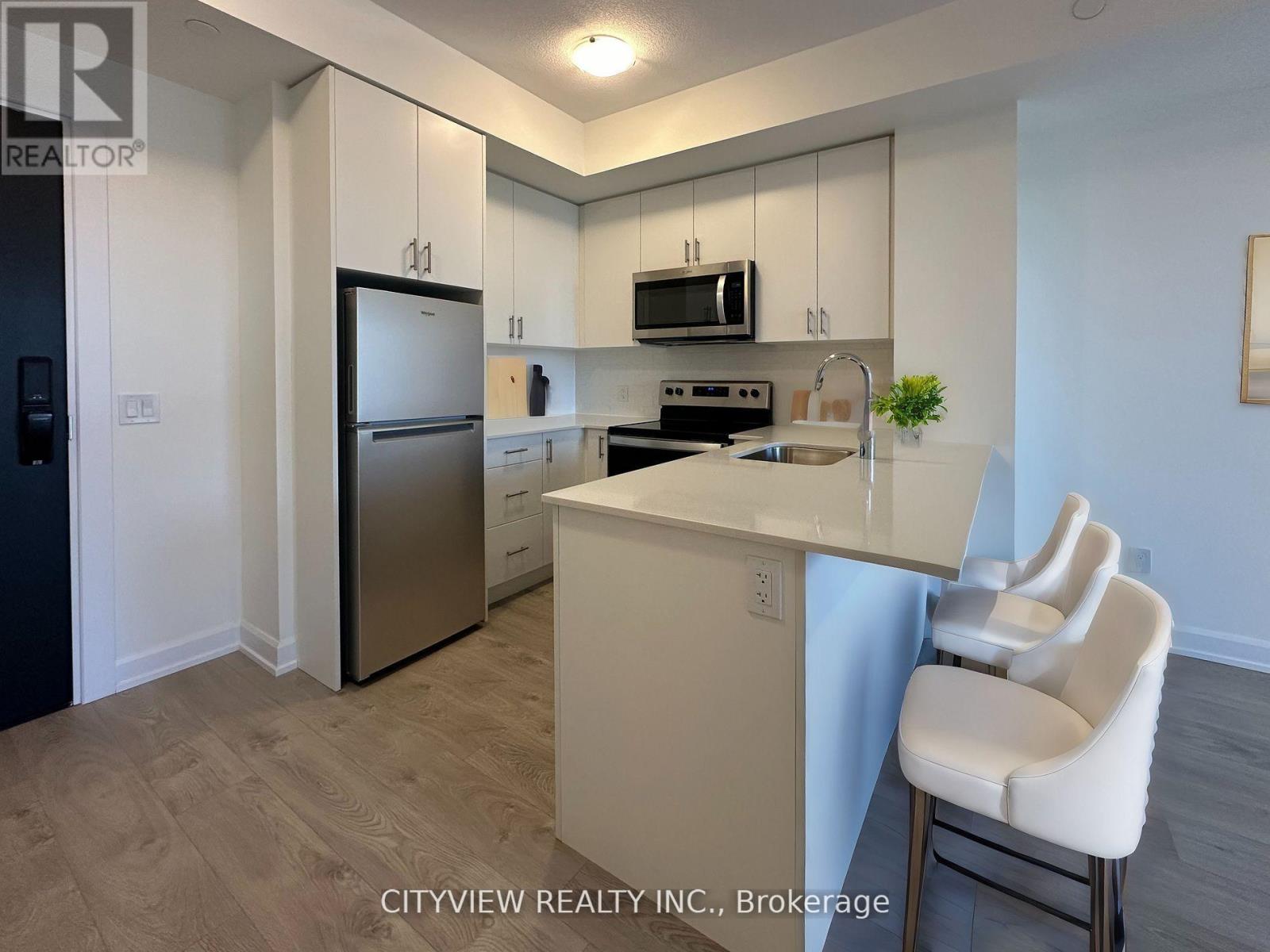 820 - 3220 William Coltson Avenue, Oakville, Ontario  L6H 7C2 - Photo 2 - W12679108