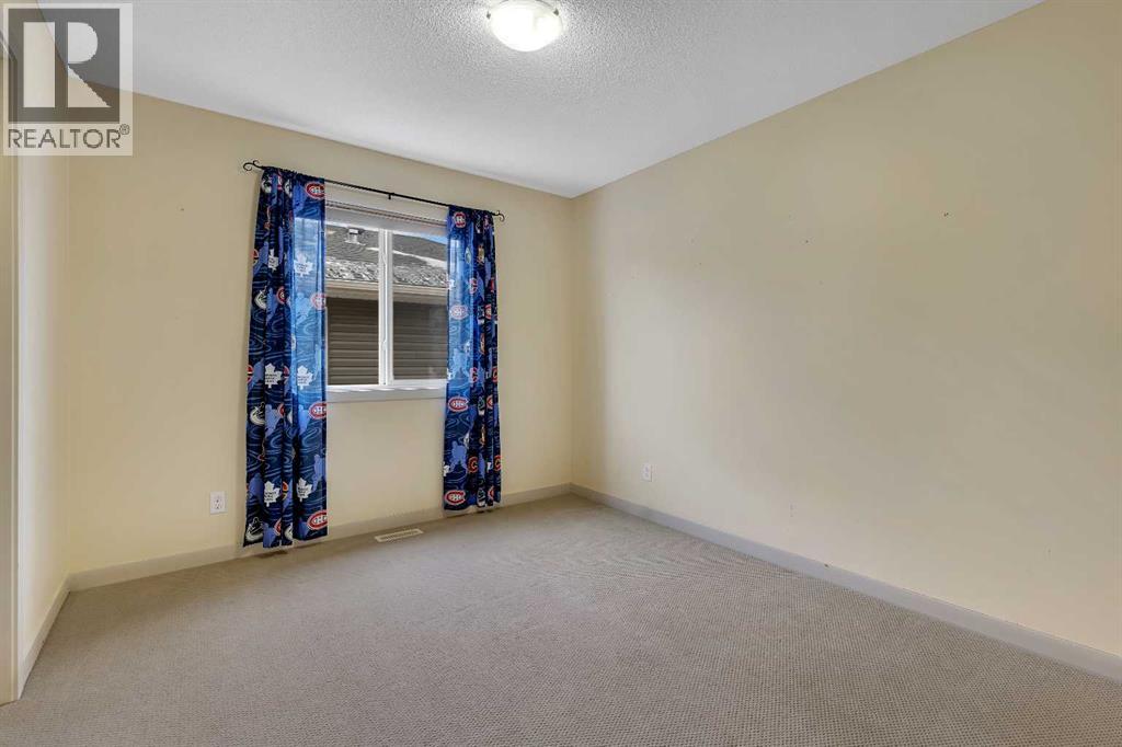 7 Westridge Green, Okotoks, Alberta  T1S 0J9 - Photo 28 - A2277775