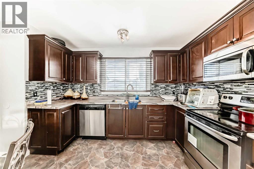 6944 Temple Drive Ne, Calgary, Alberta  T1Y 4X9 - Photo 5 - A2276167