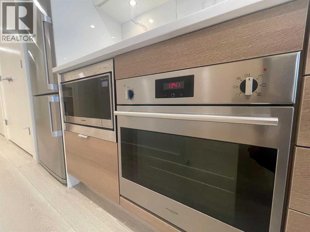 703, 108 Waterfront Court Sw, Calgary, Alberta  T2P 1K7 - Photo 4 - A2266280