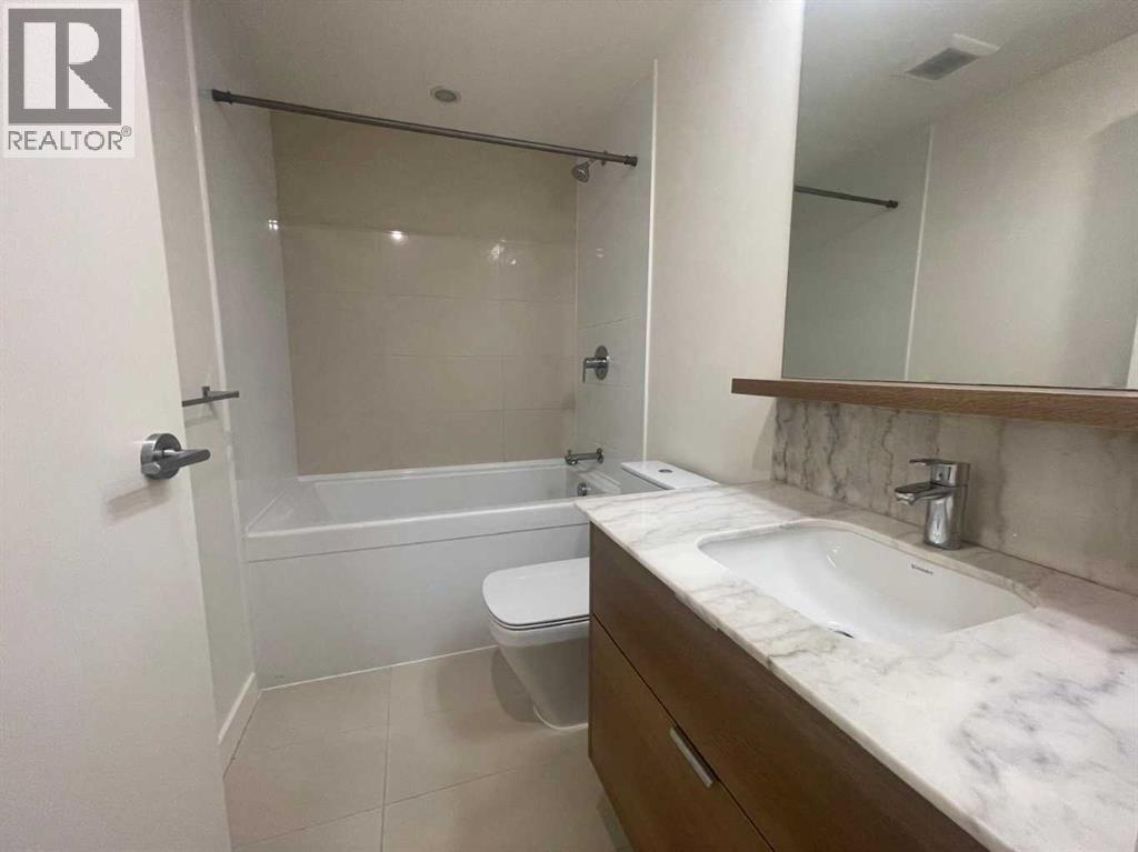 703, 108 Waterfront Court Sw, Calgary, Alberta  T2P 1K7 - Photo 5 - A2266280