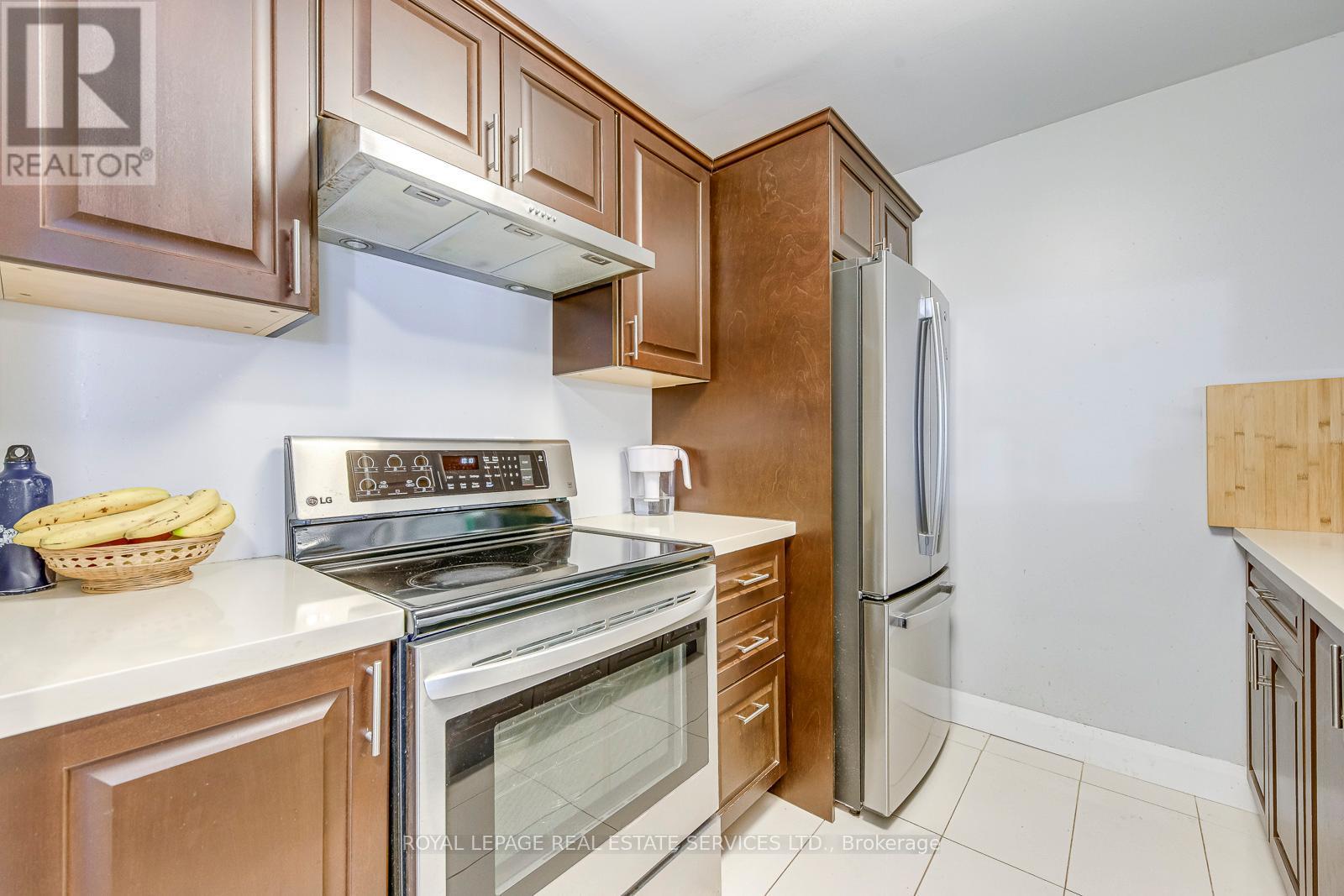 911 - 1450 Glen Abbey Gate, Oakville (Ga Glen Abbey), Ontario  L6M 2V7 - Photo 18 - W12679320