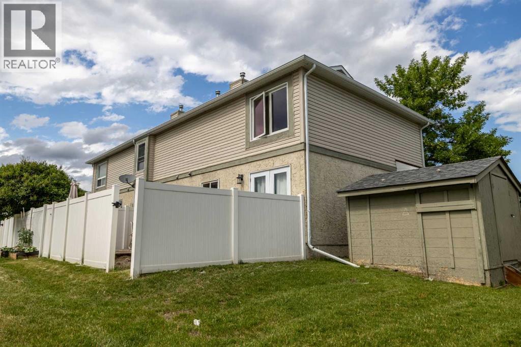 105 Deer Ridge Lane Se, Calgary, Alberta  T2J 6M8 - Photo 3 - A2268225