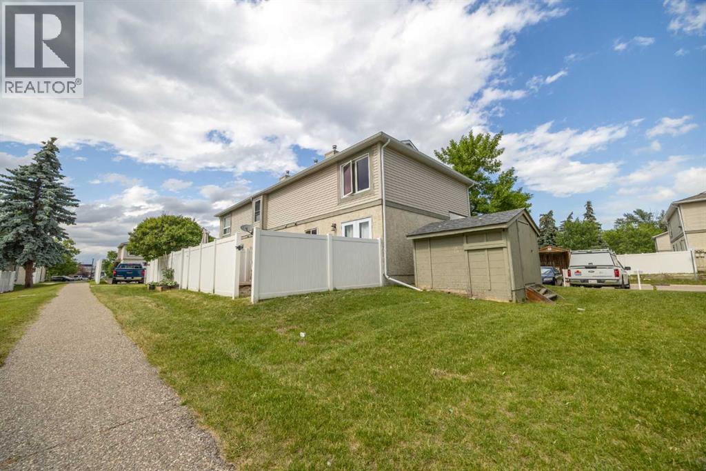 105 Deer Ridge Lane Se, Calgary, Alberta  T2J 6M8 - Photo 4 - A2268225