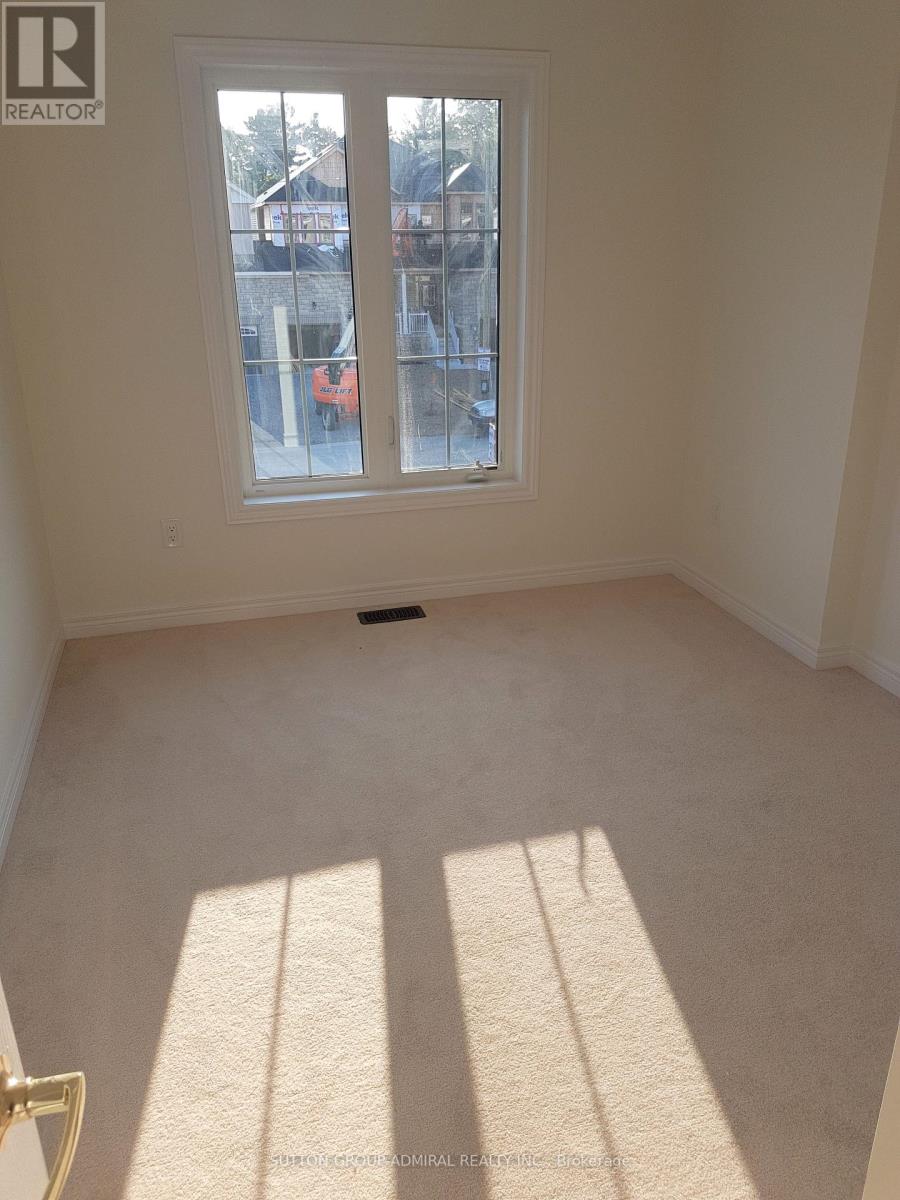 38 Greenwood Drive, Essa, Ontario  L4M 1B4 - Photo 8 - N12679524