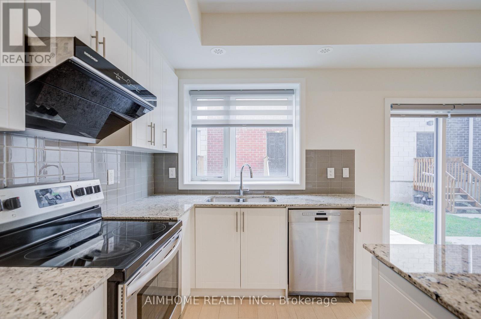 135 Frederick Tisdale Drive, Toronto, Ontario  M3K 0C6 - Photo 2 - W12679964