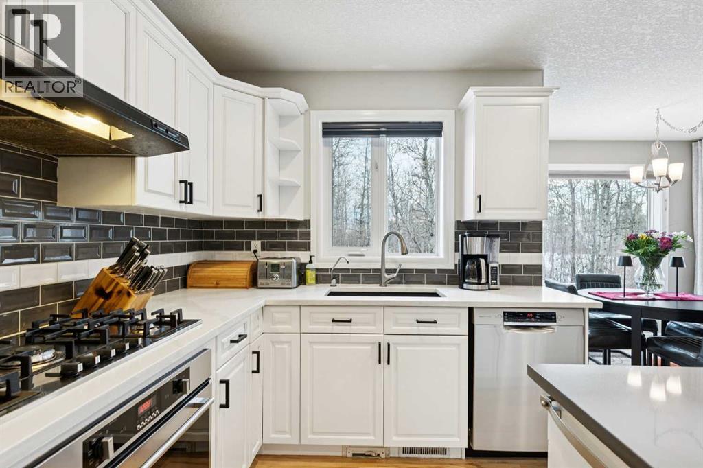 810 Wentworth Place Sw, Calgary, Alberta  T3H 4P1 - Photo 7 - A2277691