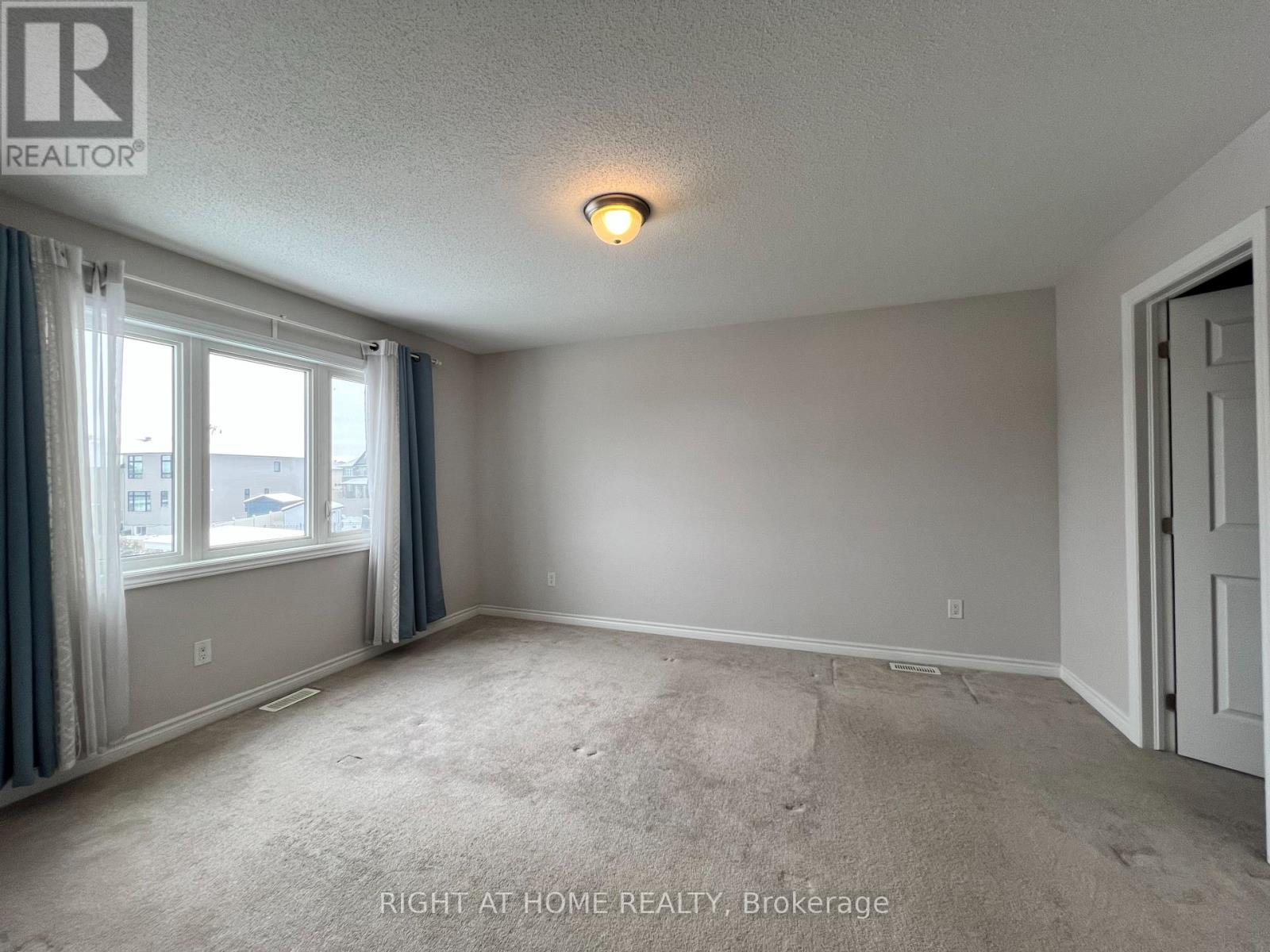 529 Honeylocust Avenue, Ottawa, Ontario  K2V 0K9 - Photo 11 - X12481371