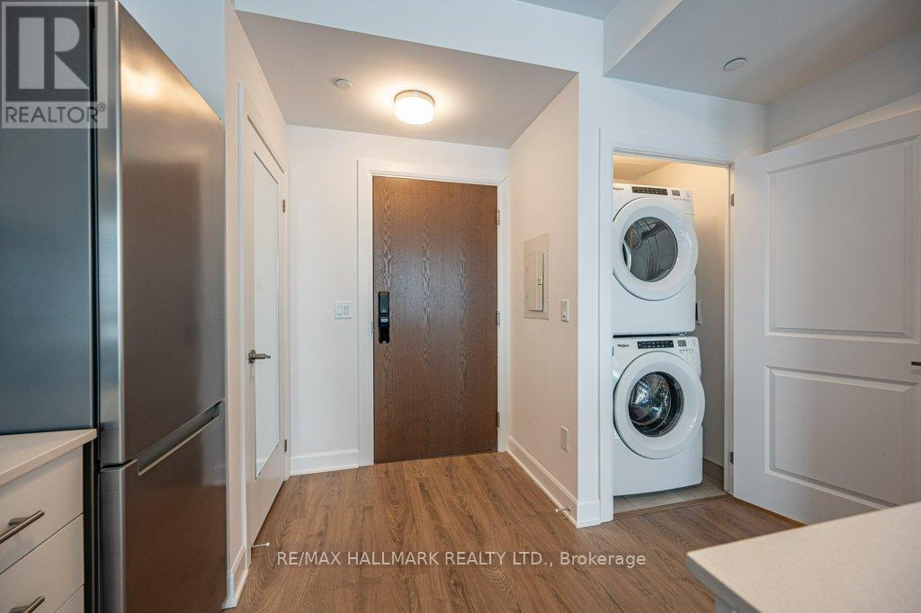 1005 - 3240 William Coltson Avenue, Oakville, Ontario  L6H 8C8 - Photo 4 - W12680056