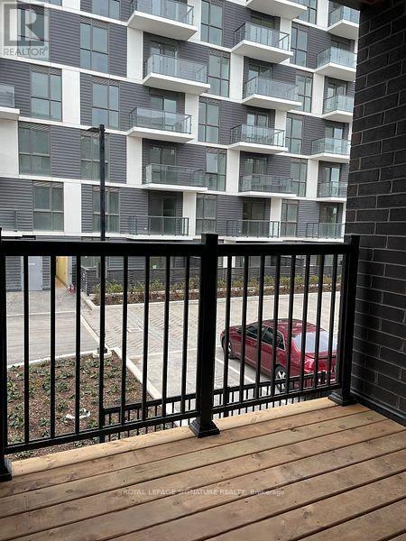 214 - 349 Wheat Boom Drive, Oakville, Ontario  L6H 7X5 - Photo 1 - W12680292