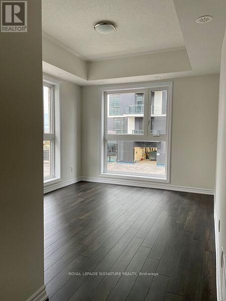 214 - 349 Wheat Boom Drive, Oakville, Ontario  L6H 7X5 - Photo 2 - W12680292