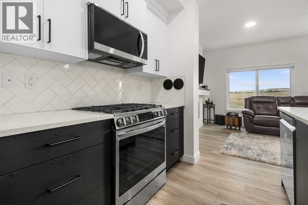 215 Heritage Heights, Cochrane, Alberta  T4C 3A7 - Photo 9 - A2278114