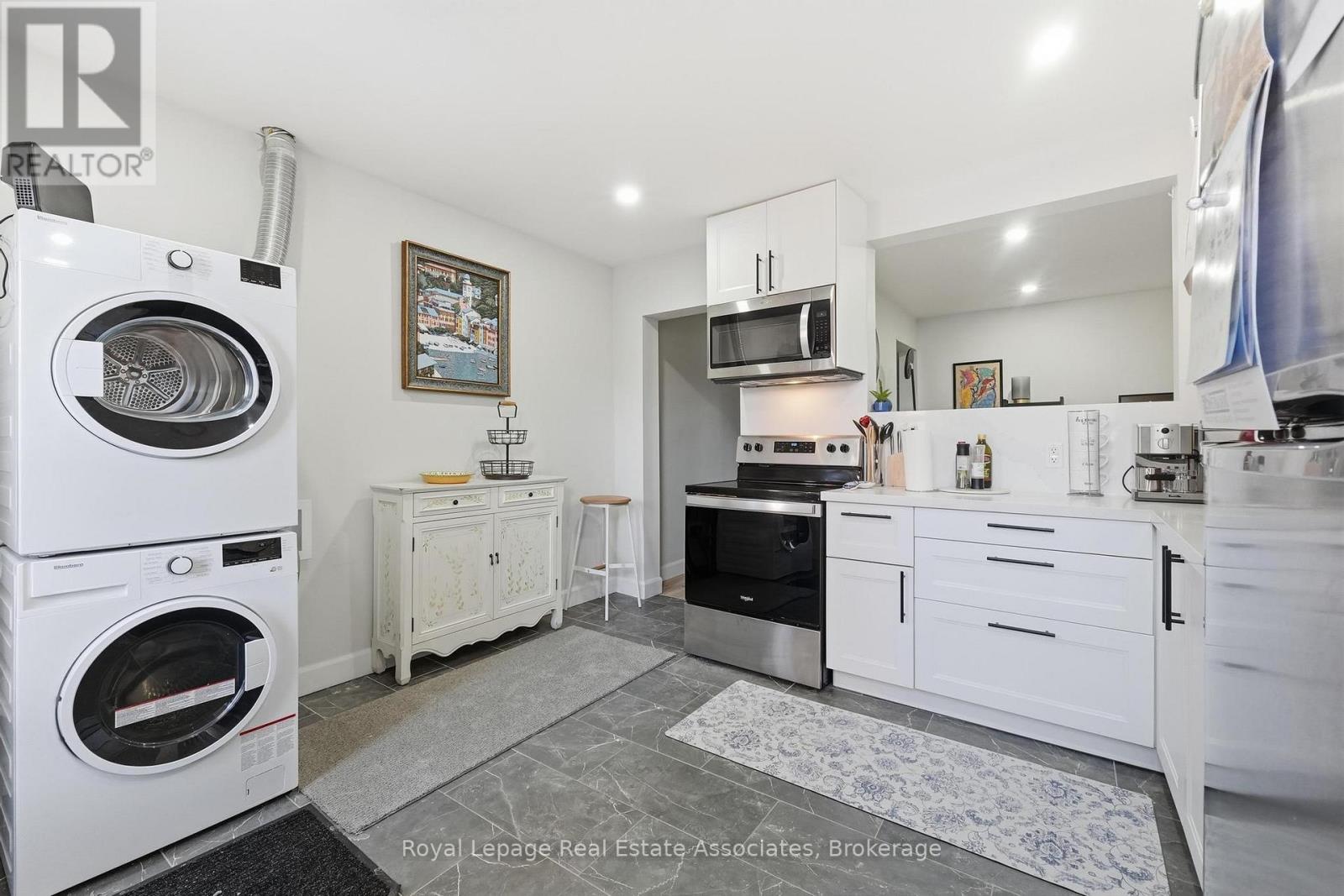 <div class="slider-price">$2,000 Monthly</div><p>2 - 66 Main Street, Halton Hills, Ontario</p>