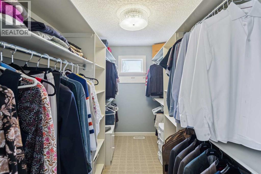 104 Strathridge Place Sw, Calgary, Alberta  T3H 4J1 - Photo 24 - A2270016