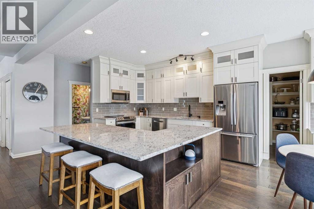 104 Strathridge Place Sw, Calgary, Alberta  T3H 4J1 - Photo 10 - A2270016