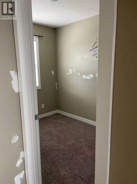 53 Panatella Road Nw, Calgary, Alberta  T3K 0S7 - Photo 10 - A2277994