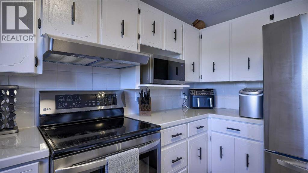 78 Athabasca Crescent, Crossfield, Alberta  T0M 0S0 - Photo 21 - A2276038