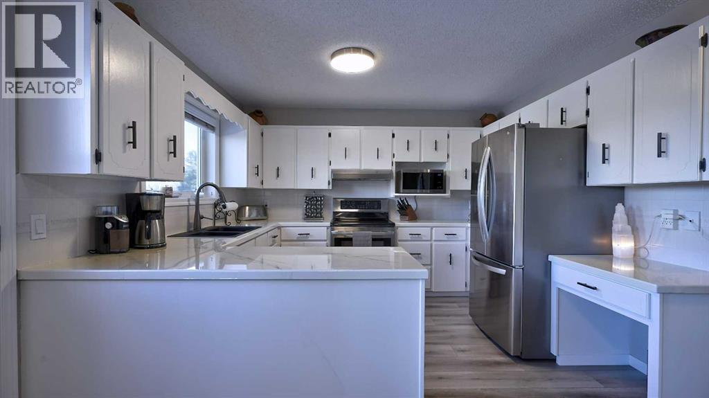 78 Athabasca Crescent, Crossfield, Alberta  T0M 0S0 - Photo 20 - A2276038