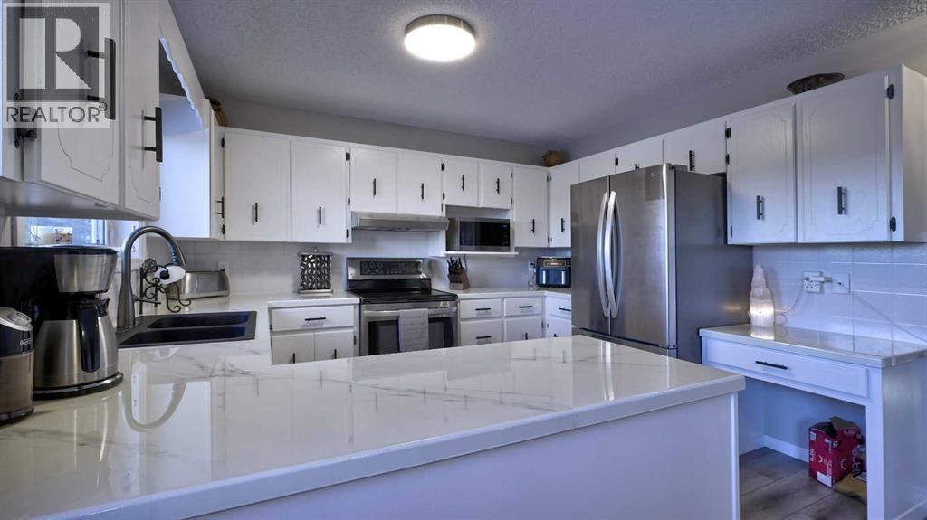 78 Athabasca Crescent, Crossfield, Alberta  T0M 0S0 - Photo 22 - A2276038