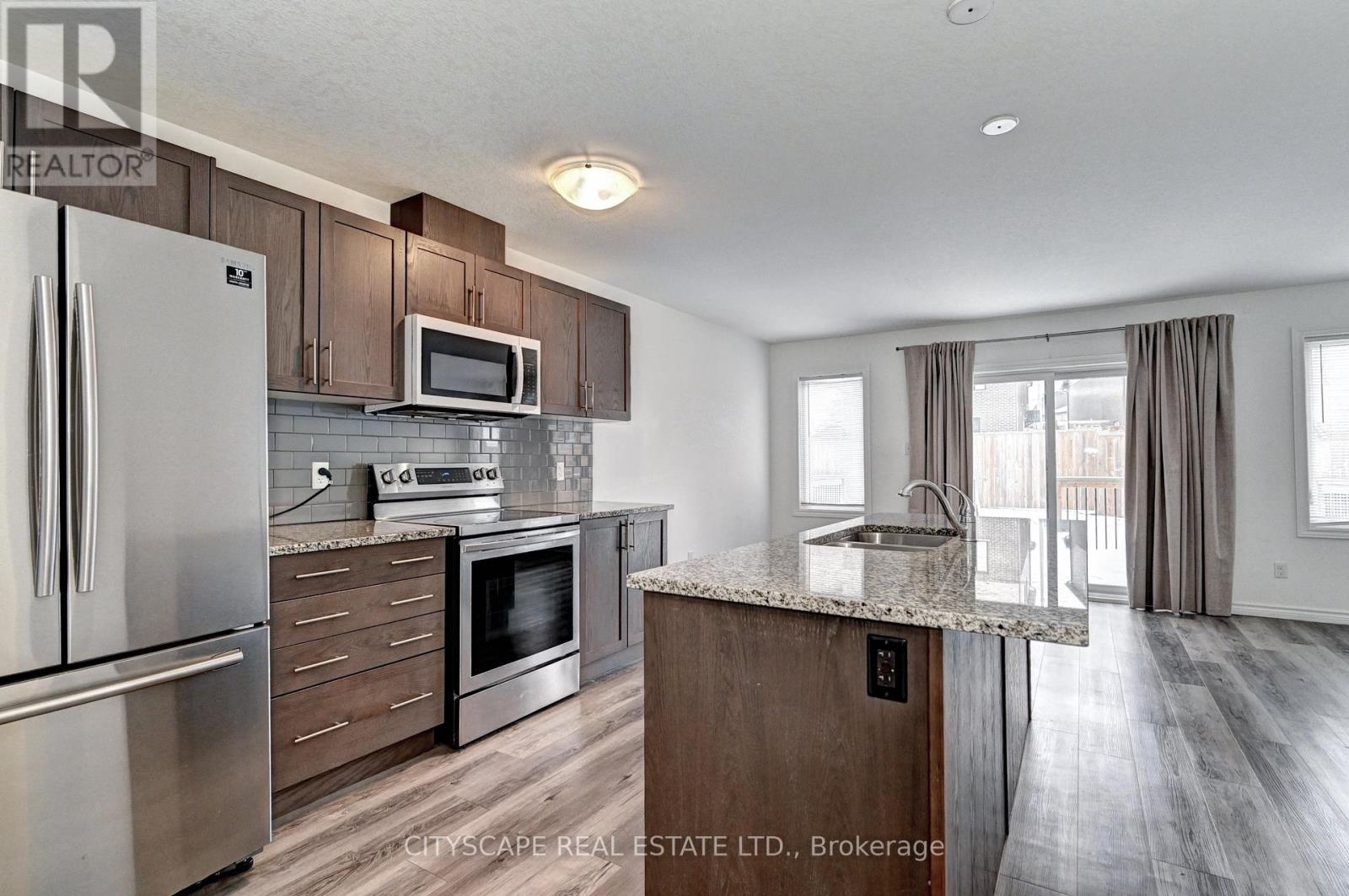 21 Woodedge Circle, Kitchener, Ontario  N2R 0P8 - Photo 14 - X12681114