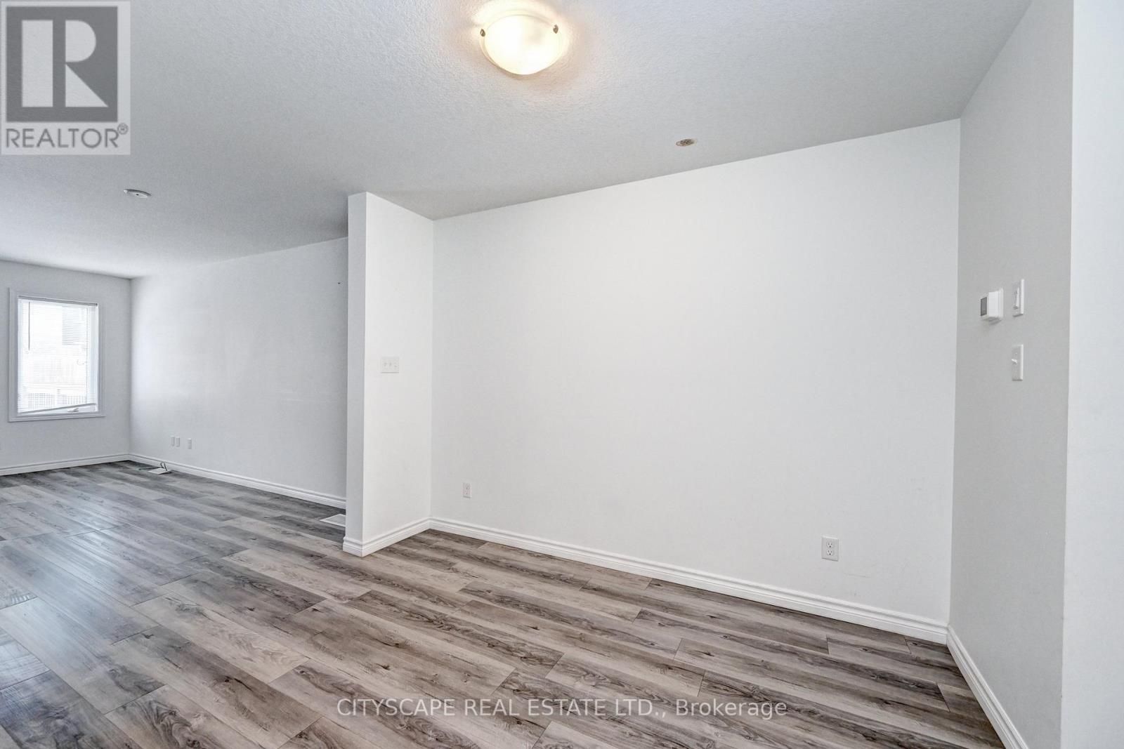 21 Woodedge Circle, Kitchener, Ontario  N2R 0P8 - Photo 6 - X12681114