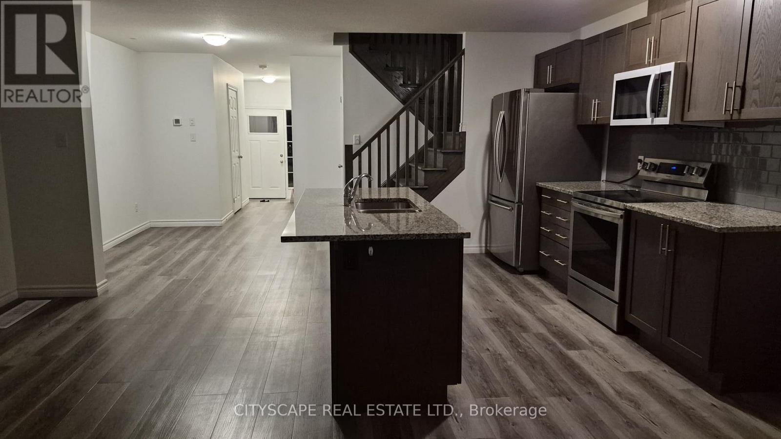 21 Woodedge Circle, Kitchener, Ontario  N2R 0P8 - Photo 7 - X12681114