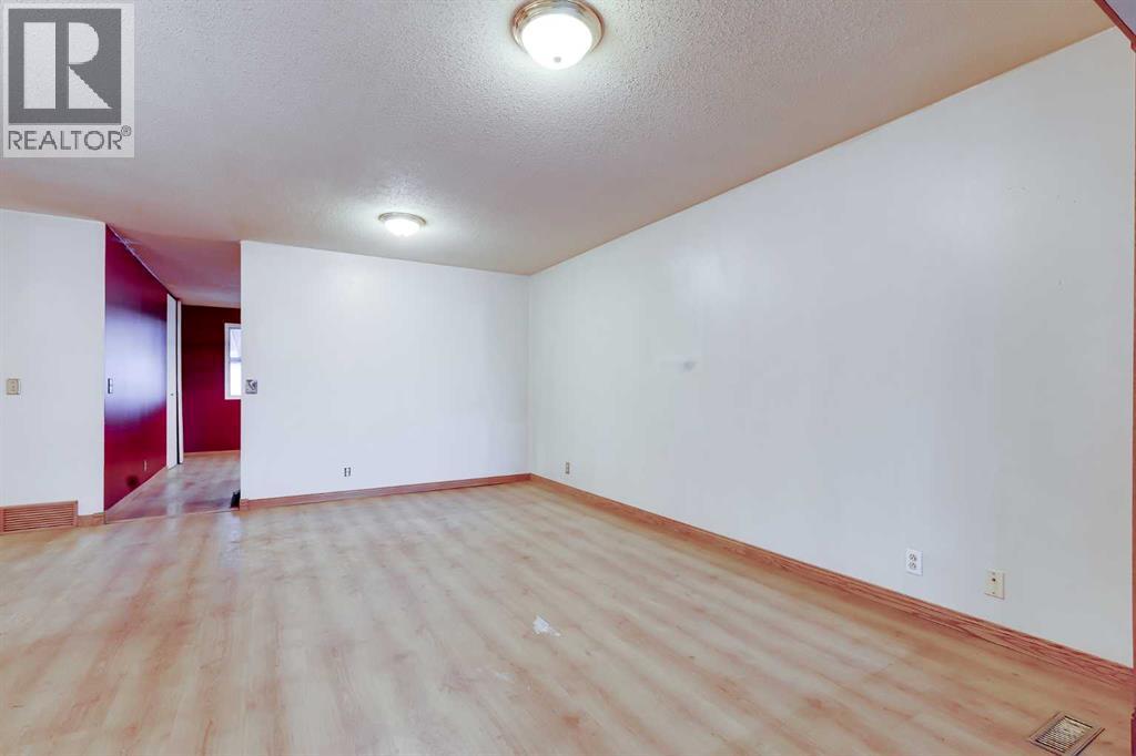 31 Macewan Park Link Nw, Calgary, Alberta  T3K 3E9 - Photo 5 - A2277340