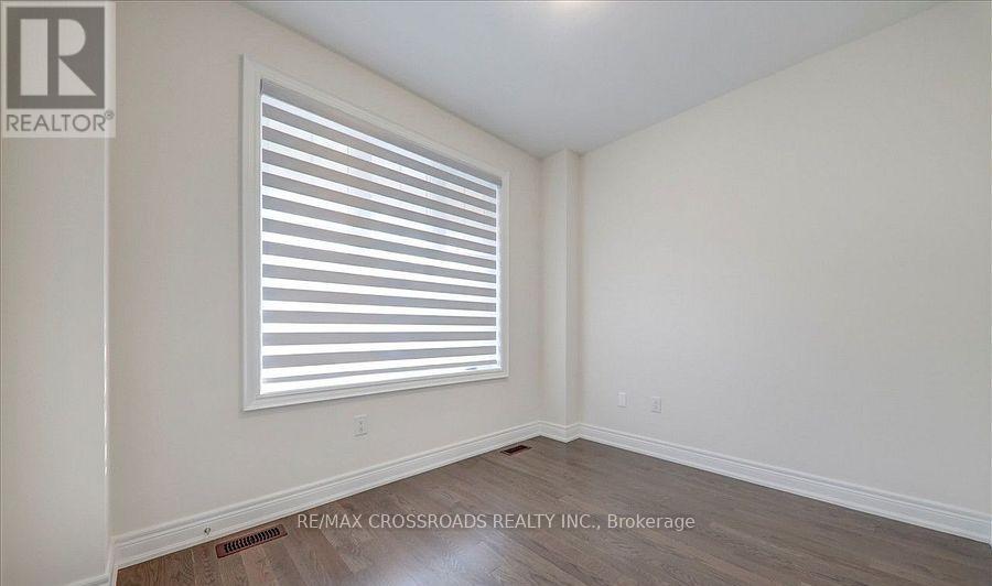 132 Ben Sinclair Avenue, East Gwillimbury (Queensville), Ontario  L4N 0Z2 - Photo 7 - N12681348