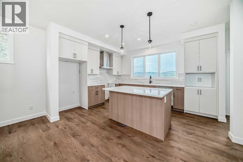 426 Heartland Way, Cochrane, Alberta  T4C 3E5 - Photo 5 - A2235464