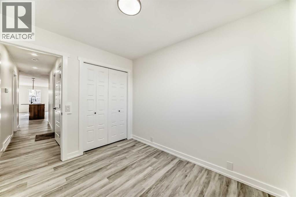 946 Berkley Drive Nw, Calgary, Alberta  T3K 1A2 - Photo 21 - A2264876