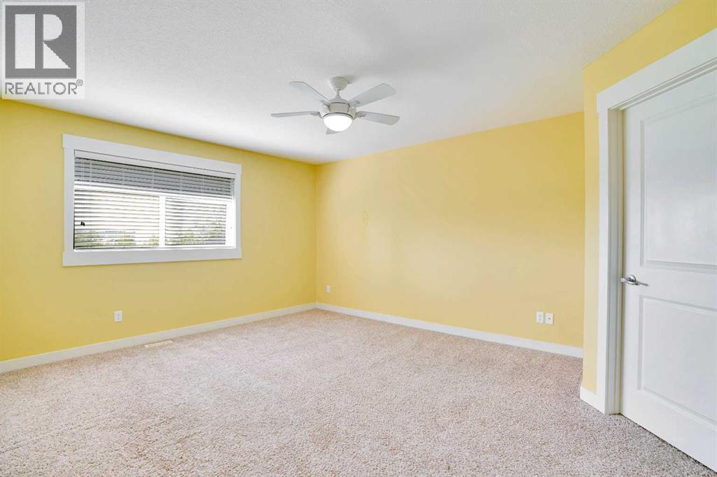 157 Rainbow Falls Boulevard, Chestermere, Alberta  T1X 0N6 - Photo 21 - A2276880