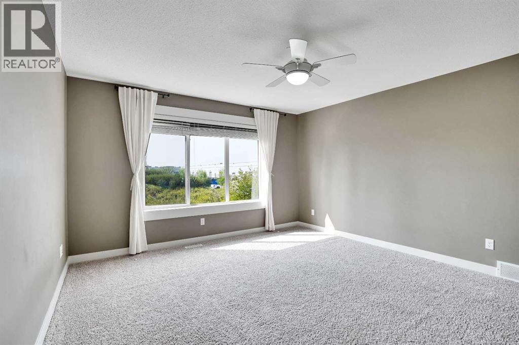 157 Rainbow Falls Boulevard, Chestermere, Alberta  T1X 0N6 - Photo 19 - A2276880