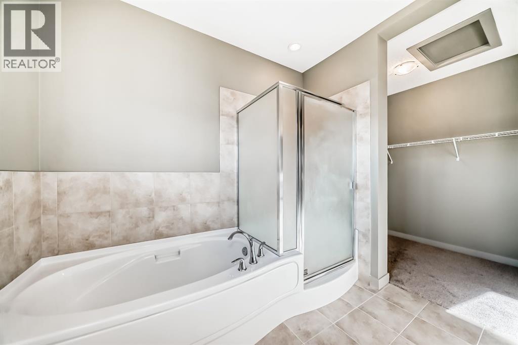 12 Cougar Ridge Landing Sw, Calgary, Alberta  T3H 0X8 - Photo 29 - A2277045