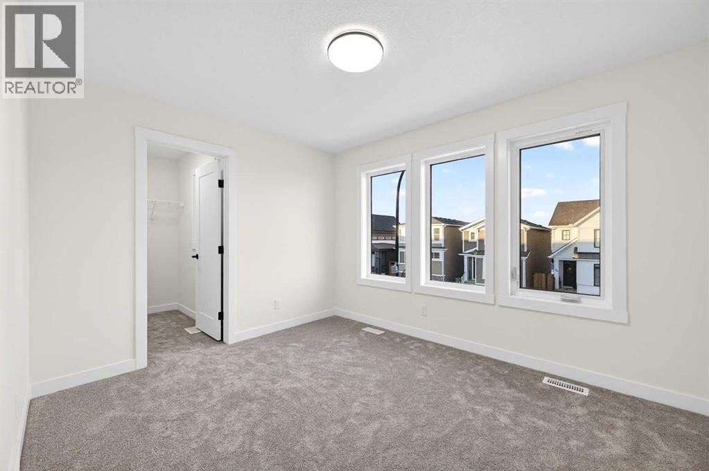 29 Rowmont Common Nw, Calgary, Alberta  T3L 0L4 - Photo 25 - A2277545