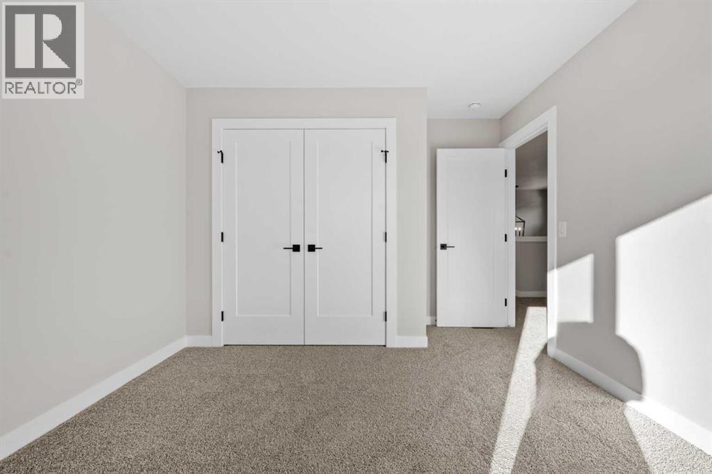 85 Quartz Crescent, Cochrane, Alberta  T4C 3G2 - Photo 26 - A2269392