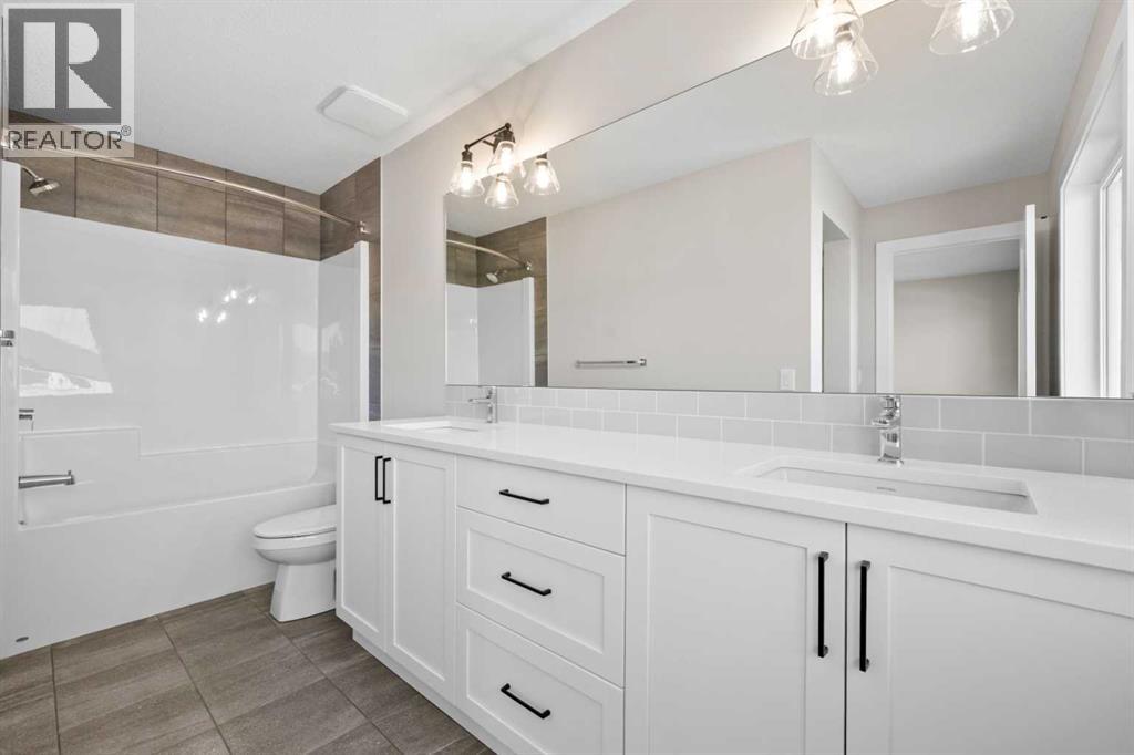 85 Quartz Crescent, Cochrane, Alberta  T4C 3G2 - Photo 22 - A2269392