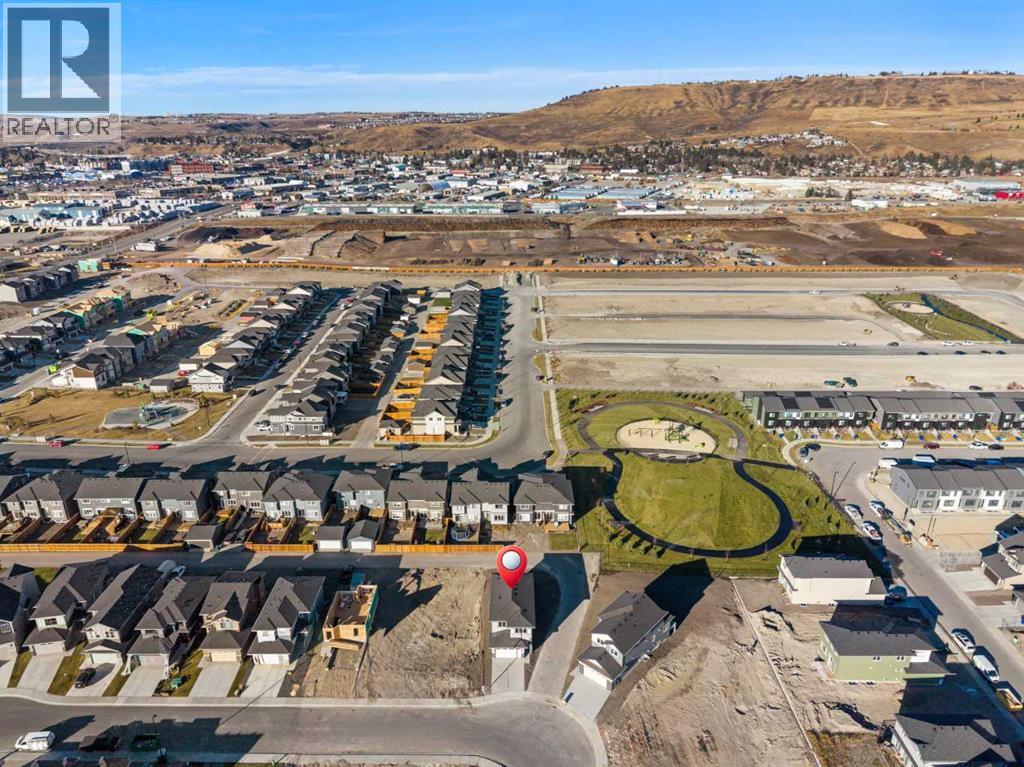 85 Quartz Crescent, Cochrane, Alberta  T4C 3G2 - Photo 40 - A2269392