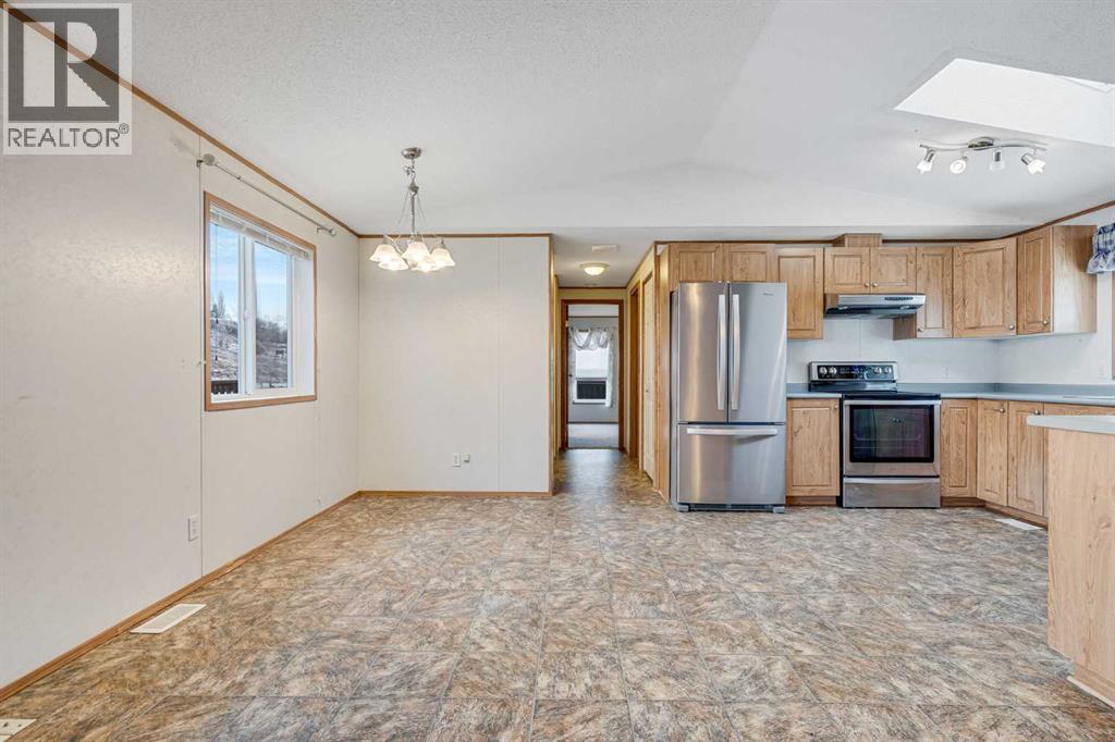 413 Heritage Crescent, Okotoks, Alberta  T1S 1P2 - Photo 9 - A2276756