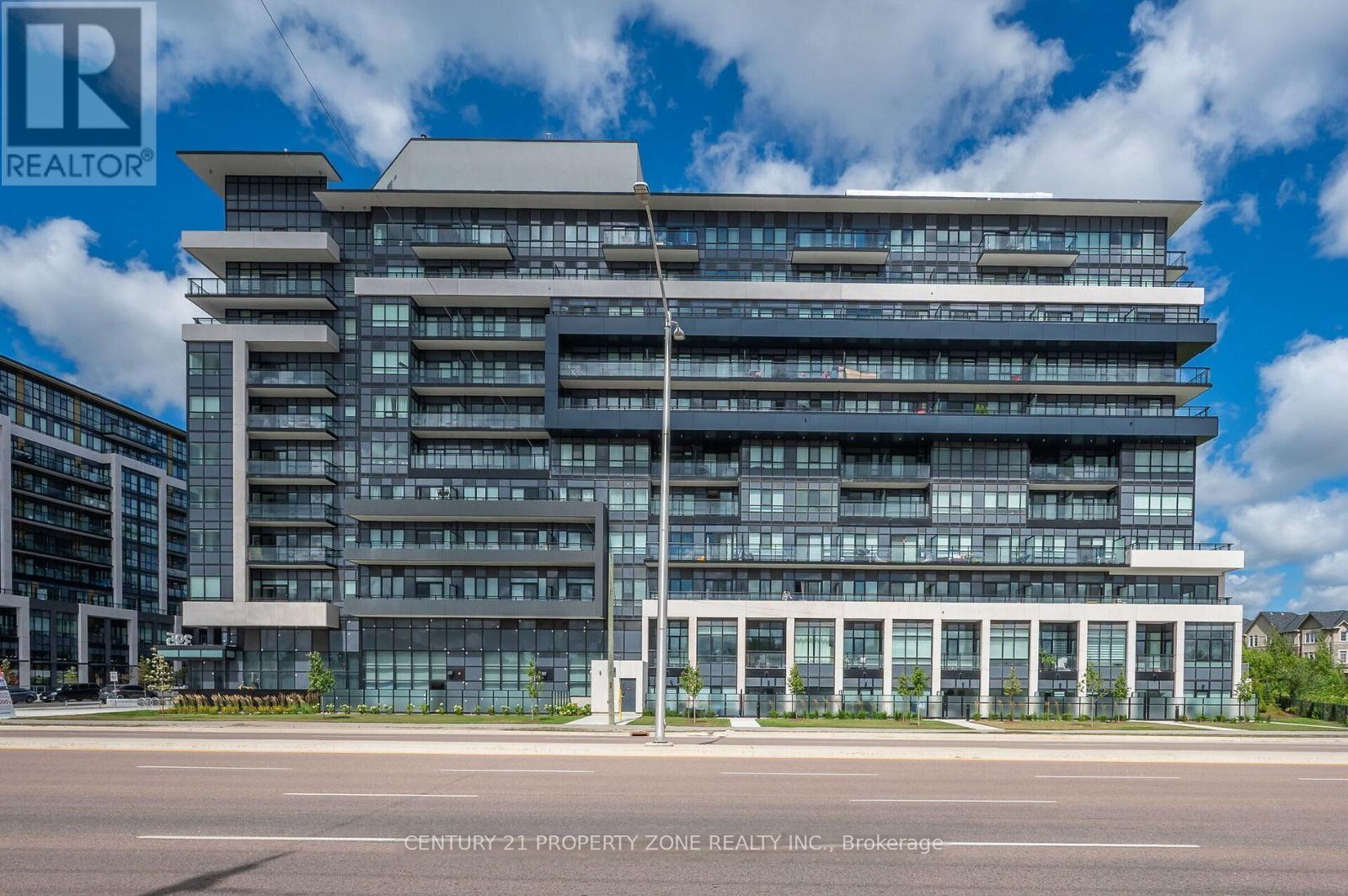 409 - 395 Dundas Street W, Oakville, Ontario  L6M 5R8 - Photo 1 - W12682838