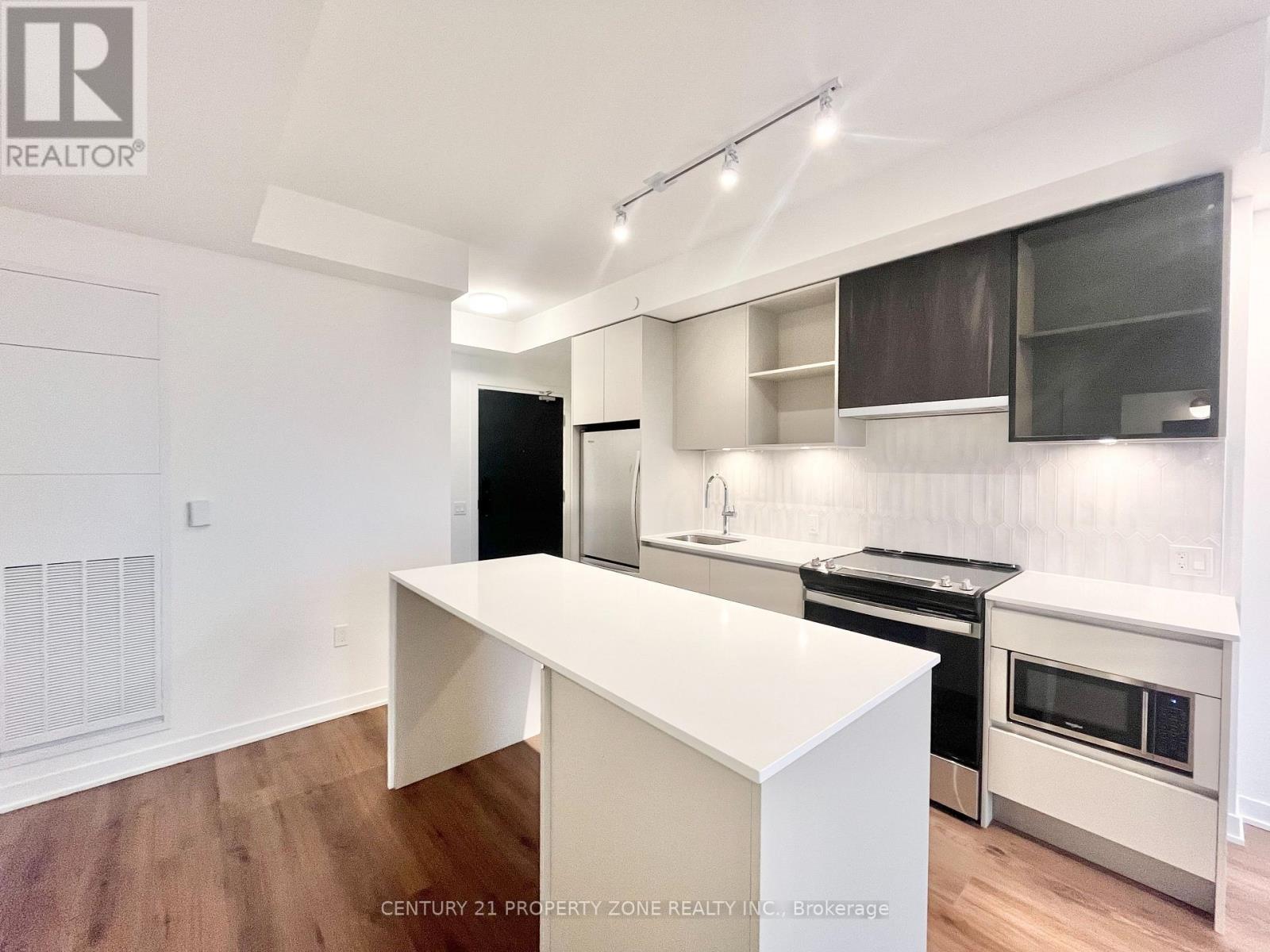 409 - 395 Dundas Street W, Oakville, Ontario  L6M 5R8 - Photo 11 - W12682838