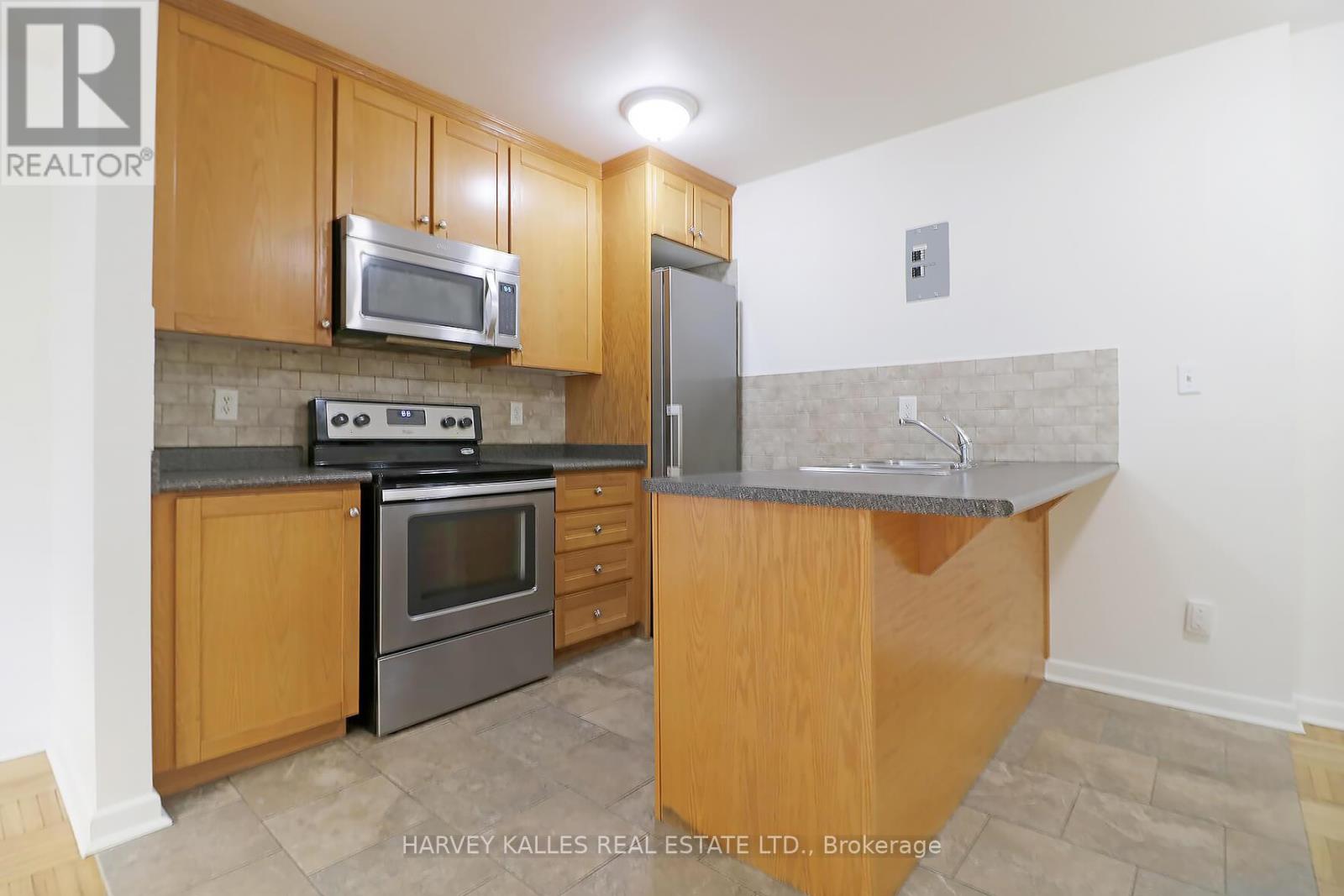 108 - 500 Gilbert Avenue, Toronto, Ontario  M6E 4X5 - Photo 6 - W12682962