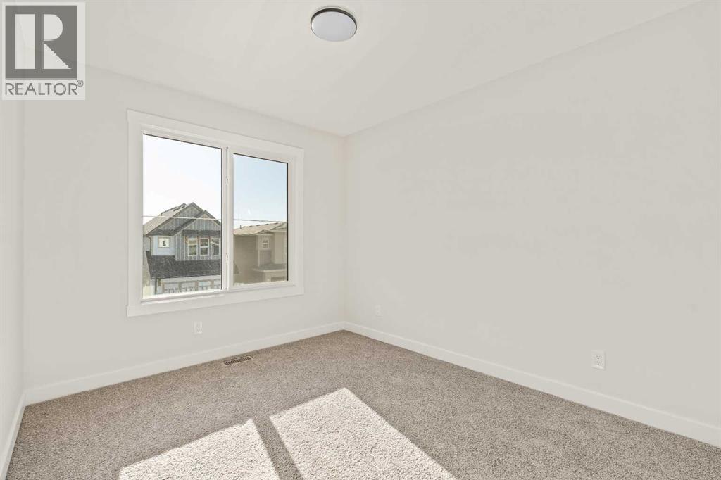 82 Royston Park Nw, Calgary, Alberta  T3L 0M5 - Photo 30 - A2274872