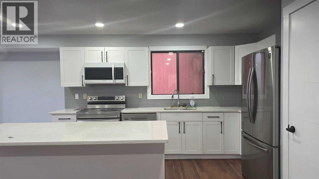 257 Macewan Glen Drive Nw, Calgary, Alberta  T3K 2G5 - Photo 7 - A2278098