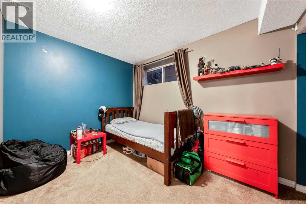 21 Mckinnon Street Nw, Langdon, Alberta  T0J 1X2 - Photo 32 - A2274079