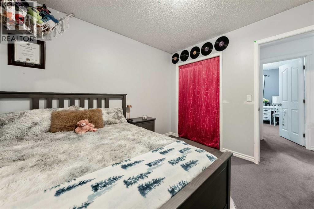 21 Mckinnon Street Nw, Langdon, Alberta  T0J 1X2 - Photo 27 - A2274079